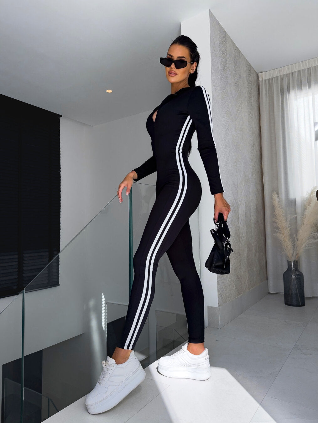 R&B | Dynamischer Jumpsuit Mit Streifen