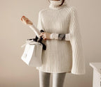 Damen Strickpullover mit hohem Kragen und asymmetrischem Schnitt