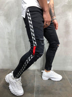 Herren modische Ripped Jeans mit kontrastierenden seitlichen Streifen und detailverliR&Bten Designelementen R&B