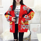 Damen Strickjacke mit buntem grafischen Design und gemütlichen Knöpfen