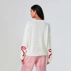 R&B | Festlicher Strickpullover mit Schleifen-Design
