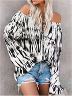 Damen Freizeitbluse mit Off-Shoulder Schnitt und lässigen Rüschendetails