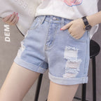 Damen Jeansshorts mit modischem Distressed-Design und lässigem Aufschlag
