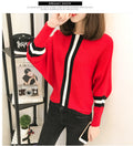 Damen sportlicher Strickpullover mit breiten Ärmeln und kreativen Streifen