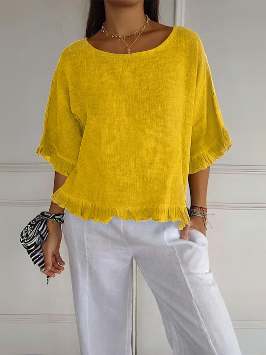Feminine Rüschenbluse aus hochwertigem Stoff