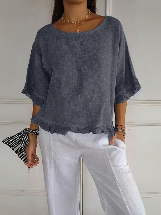 Feminine Rüschenbluse aus hochwertigem Stoff