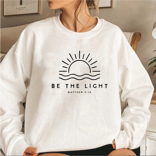 Pullover „Be The Light“.