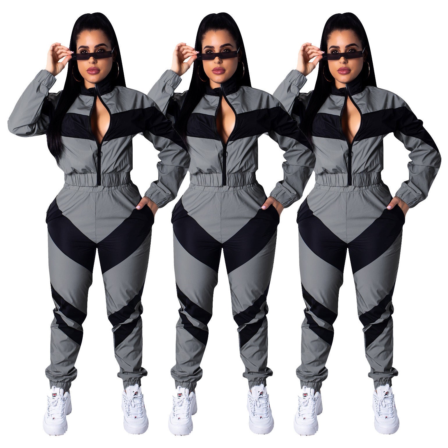 Damen sportlicher Jumpsuit mit modischen Farbblockdetails und hohem Kragen