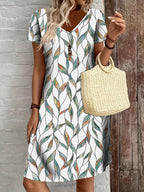 R&B | Sommerkleid mit Blättermuster Enganliegendes Midi-Kleid mit V-Ausschnitt