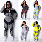 Damen sportlicher Jumpsuit mit modischen Farbblockdetails und hohem Kragen