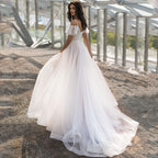 Damen Elegantes Hochzeitskleid mit transparenten Puffärmeln und glitzerndem Oberteil R&B
