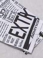 Hemdkleid mit Zeitungsdruck