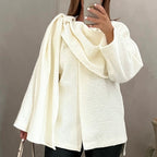 R&B | Bouclé Poncho mit Schal-Detail