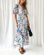 R&B | Elegantes Kleid mit Blumendruck und V-Ausschnitt