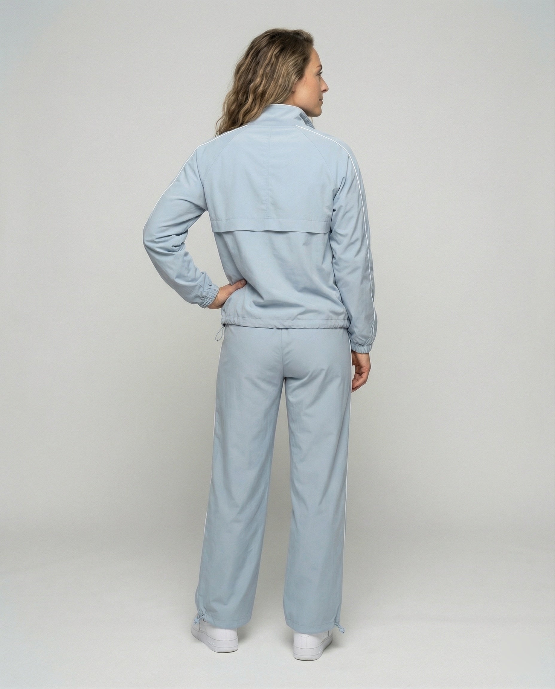 Damen sportliches Windbreaker-Set mit funktionalem Halbreißverschluss und seitlichen Kontraststreifen R&B