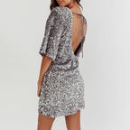 Glitzerndes Paillettenkleid mit Glockenärmeln