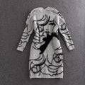 Damen Strickkleid mit kunstvollem Grafikdesign und elegantem V-Ausschnitt