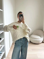 R&B | übergroßer Pullover mit eleganten Stickerei-Details