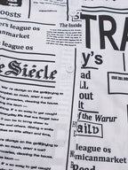 Hemdkleid mit Zeitungsdruck