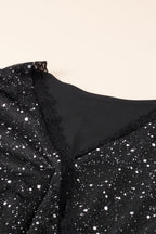 Elegante schwarze Glitzerkleid mit Netzbespannung