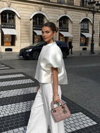 Damenbluse aus Satin mit Puffärmeln
