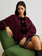 R&B | Strickcardigan mit Samtschleifen Wollmischung Feminin und Modern