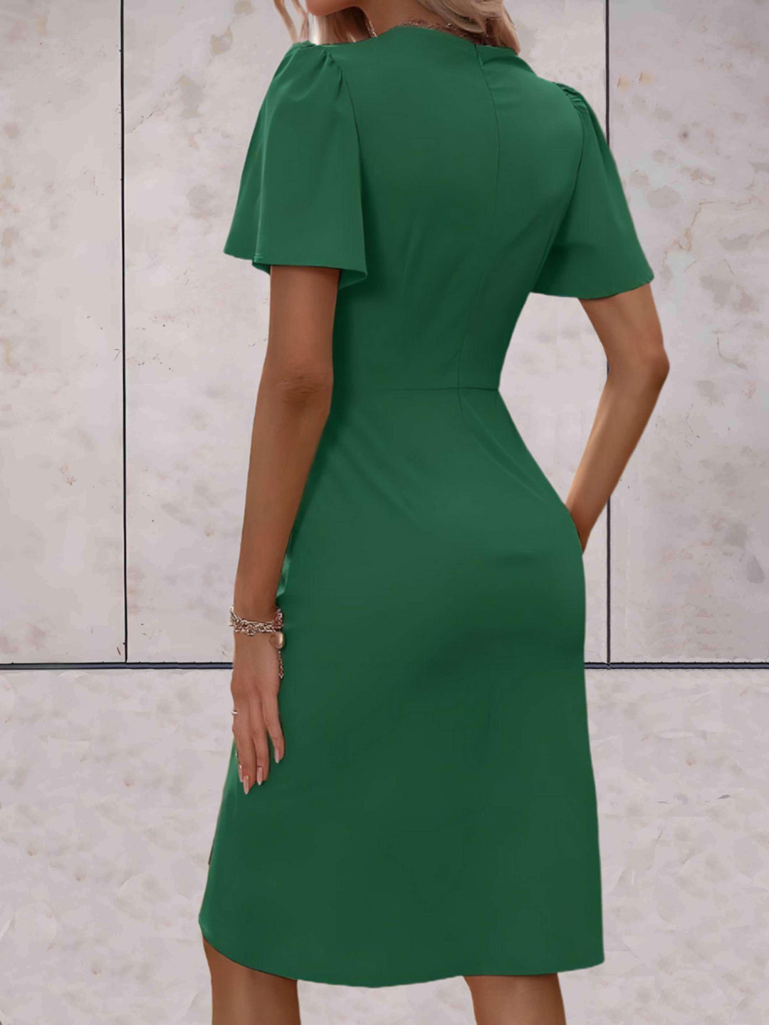 elegante wikkeljurk met korte mouwen