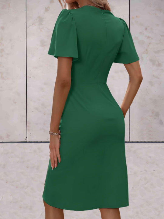 elegante wikkeljurk met korte mouwen