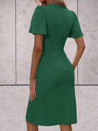 elegante wikkeljurk met korte mouwen