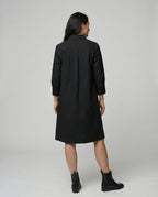Kleid mit Eleganten langen Ärmeln.