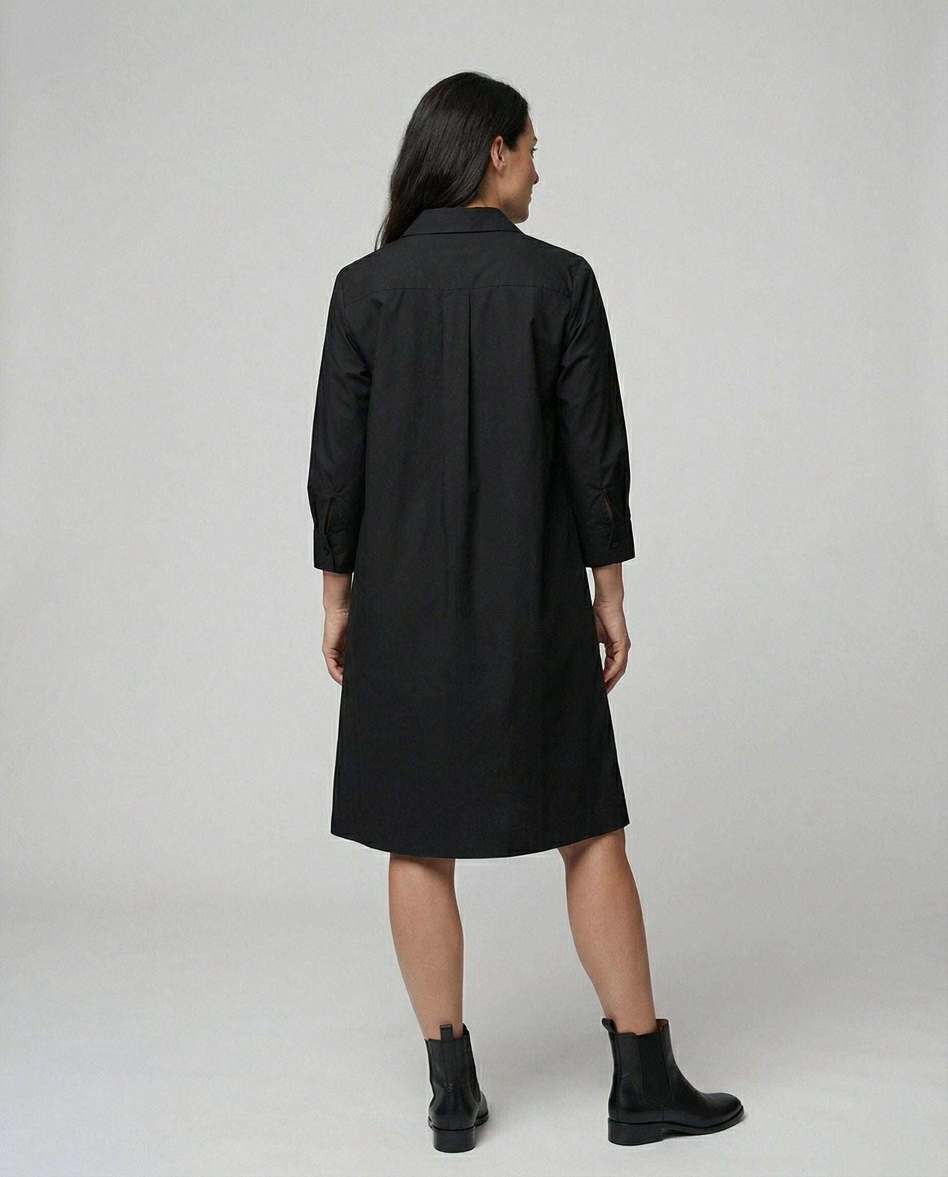 Kleid mit Eleganten langen Ärmeln.
