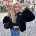 R&B | elegante wattierte Jacke aus Pelz