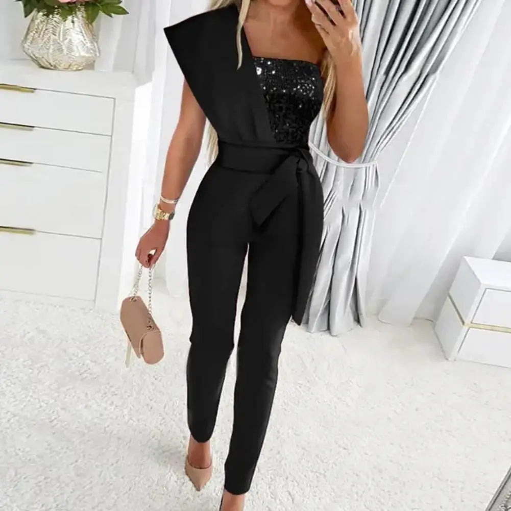 EB - Jumpsuit mit Patchwork und funkelnden Pailletten