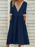 Kleid mit Spitzenverzierung und halben Ärmeln