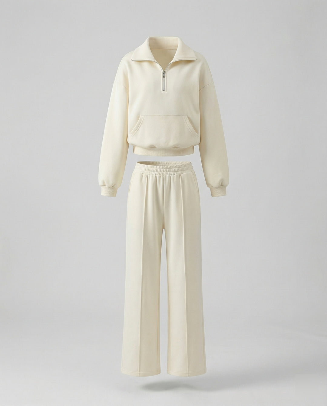 Eleganter beiger Damen Sportanzug mit Stehkragen und weiter Hose