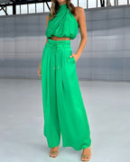 Stilvolles Set aus schlichtem Oberteil und Hose mit weitem Bein
