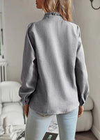 Modische Bluse mit langen Ärmeln und Streifenmuster