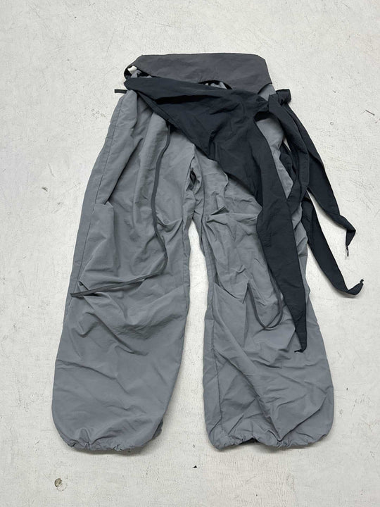 Damen modische High-Waist-Hose mit asymmetrischem Design und seitlichem Bindegurt R&B