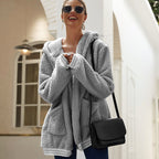 Damen kuschelige Fleecejacke mit Kapuze und seitlichen Taschen