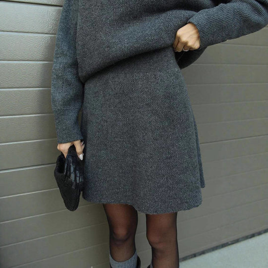 Damen bequemer Strickpullover mit überschnittenen Schultern und modischem Saum R&B