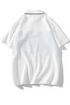 Herren Poloshirt mit modernem Schriftzug und praktischem Brusttaschen