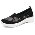 Damen Elegante Slip-On Sneakers mit floralen Stickereien
