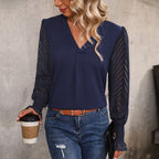 Damen Bluse mit transparenten Puffärmeln und V-Ausschnitt