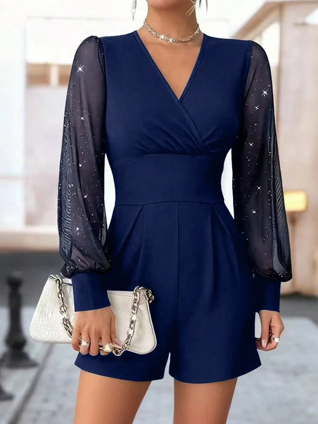Damen eleganter Jumpsuit mit transparenten Puffärmeln und V-Ausschnitt R&B