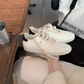 Damen Sportliche Sneaker mit minimalistischer Silhouette und atmungsaktiver Oberflächenstruktur