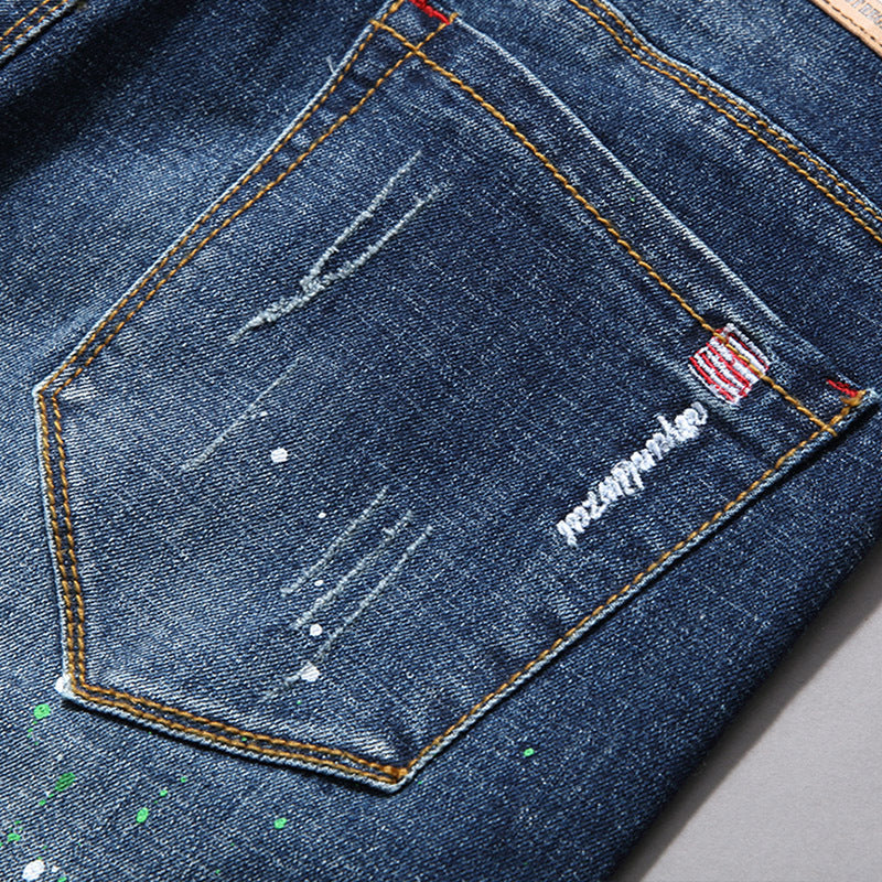 Herren modische Jeans mit kreativen Farbklecksen und Rissdesign R&B