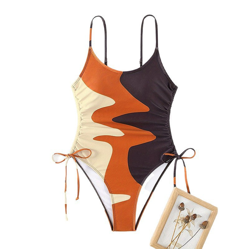 Damen Einteiler Badeanzug mit asymmetrischem Muster und verstellbarem Bindeband R&B