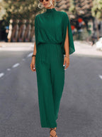 Damen Eleganter Jumpsuit mit fließendem Cape-Design und hochgeschlossenem Ausschnitt R&B