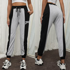Damen sportliche Jogginghose mit elastischem Bund und seitlichen Taschen