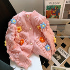 Damen Strickjacke mit Blumenapplikation und Knopfleiste